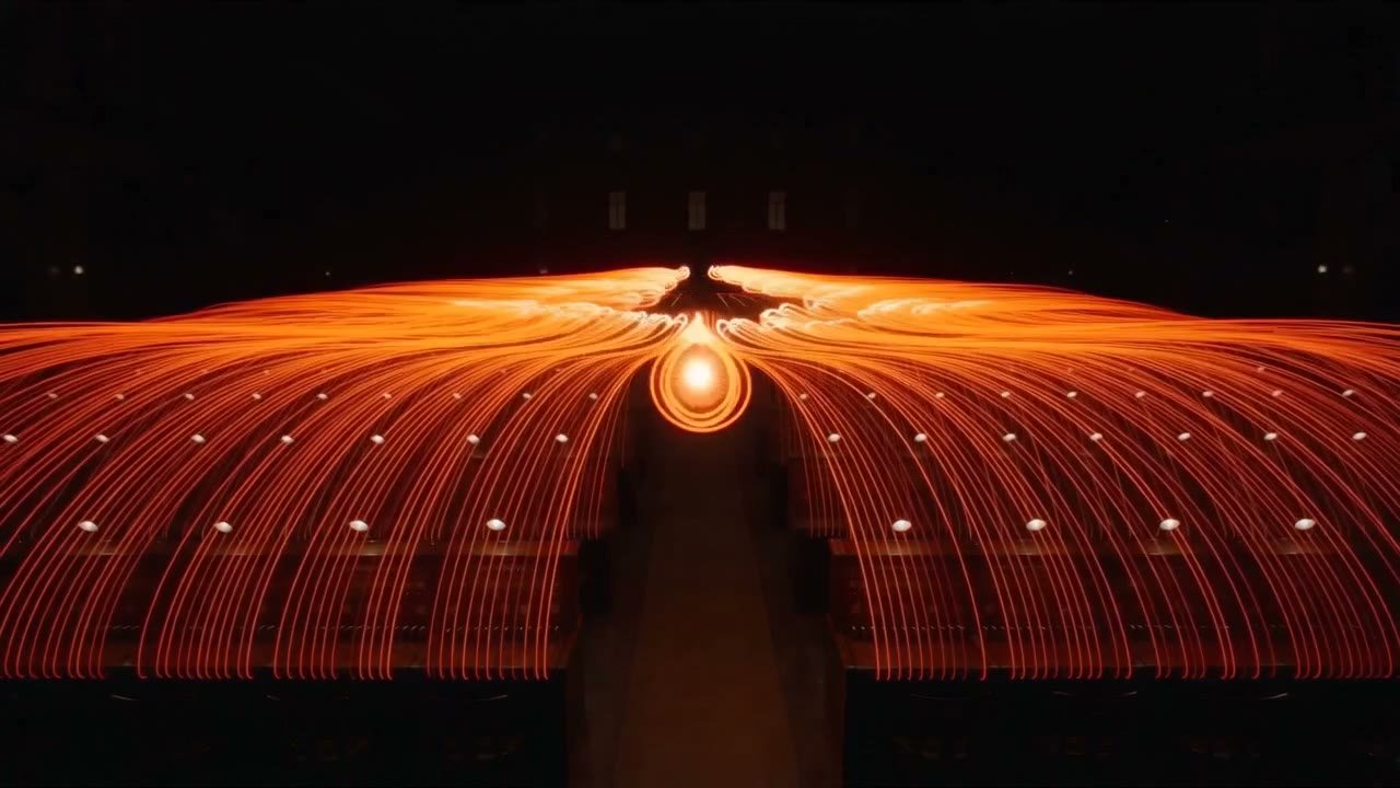 A telephone switchboard lit in red light