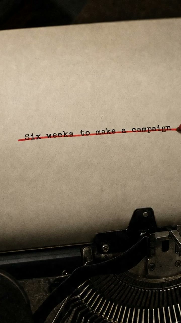 A line typed on a typewriter, struck through with a red pen
